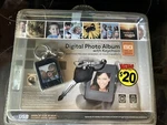 Innovage Digital Photo Album Key Chain 8MB/USB. Fixed Price $14.99.